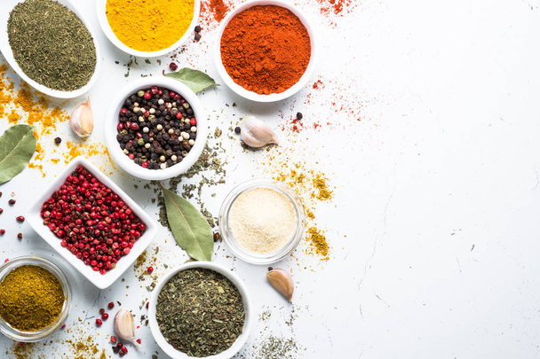 Set of spices in a bowls on white background.  - Photo, Image