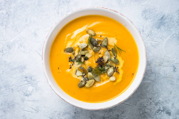 Pumpkin and carrot cream soup.  - Photo, Image