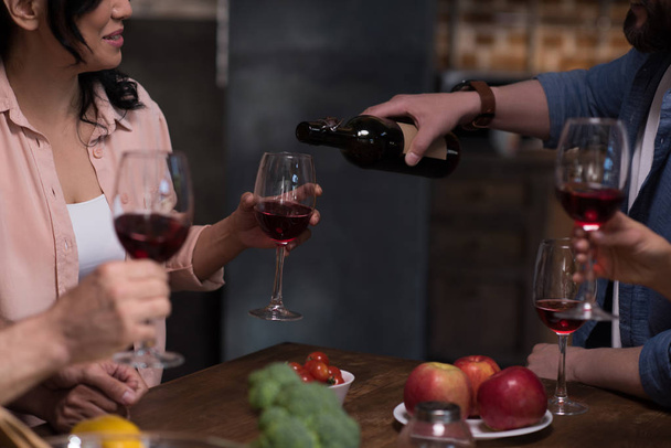 friends drinking red wine - Foto, Imagen