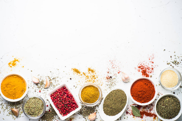 Various spices in a bowls on white.  - Foto, immagini