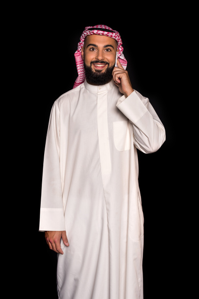 Muslimimies puhuu puhelimessa
 - Valokuva, kuva