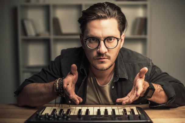man with keyboard controller - Photo, Image