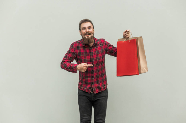 Black friday. Happiness young adult businessman holding shoping  - 写真・画像