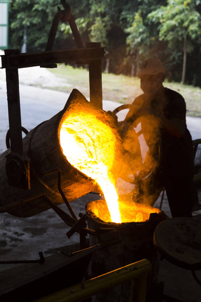 Molten iron molten metal poured in to ladle - Photo, Image