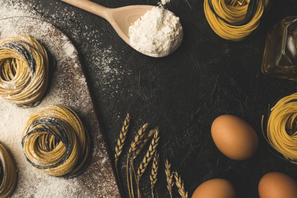 raw pasta and ingredients composition - Zdjęcie, obraz