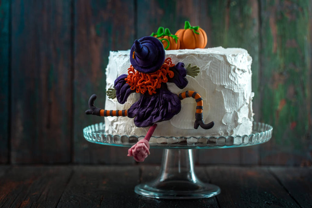 Cake with a witch and pumpkins - Фото, изображение