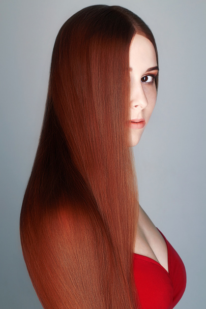 Довге руде волосся красива молода жінка
 - Фото, зображення