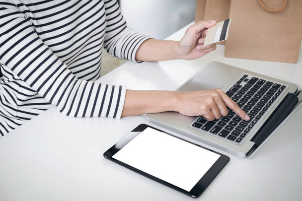 Woman's hands using credit card register and payments online sho - Foto, immagini