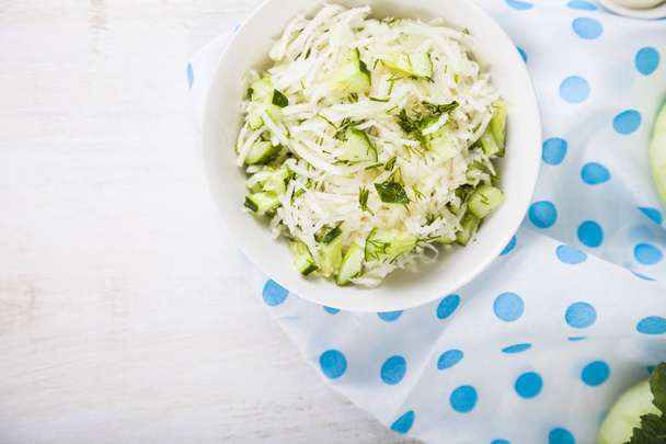 Salad with kohlrabi, cucumber and dill.  - Photo, Image