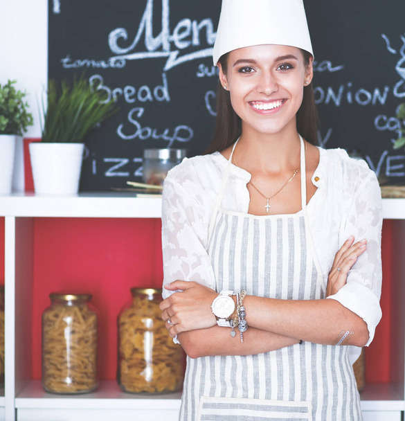 Chef woman portrait with uniform in the kitchen - Φωτογραφία, εικόνα