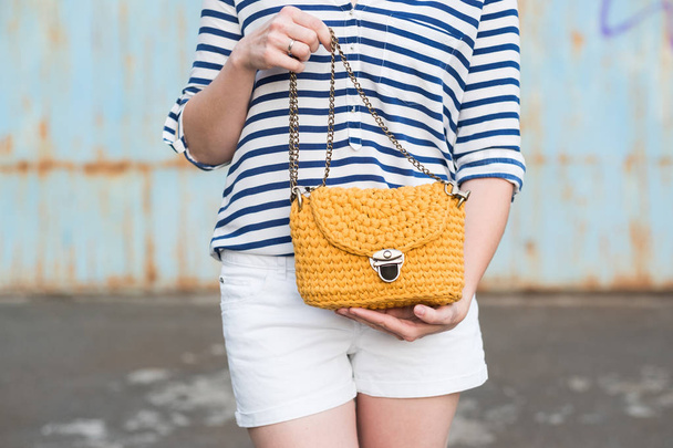 Close up photo of woman bag in hands of fashionable woman - Photo, Image