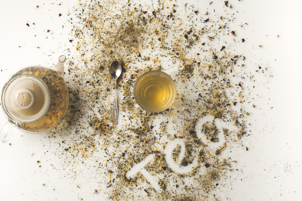 herbal tea in cup and kettle - Fotografie, Obrázek