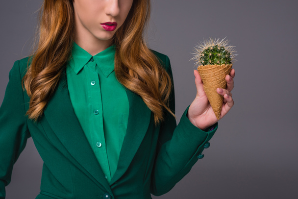 stylish girl with cactus in waffle cone - Photo, Image