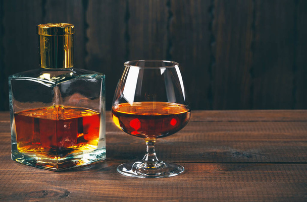 Glass of brandy or cognac  - Фото, зображення