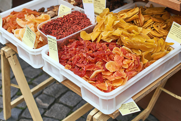 Dried papaya, melons, fig fruits, mango and other snacks being sold on the street - Φωτογραφία, εικόνα