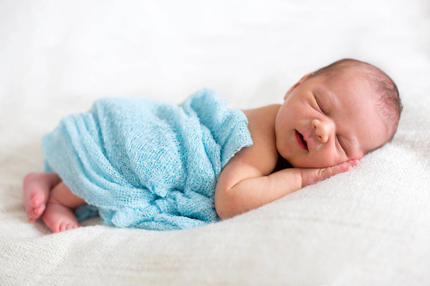 Newborn baby boy, sleeping happily - Φωτογραφία, εικόνα