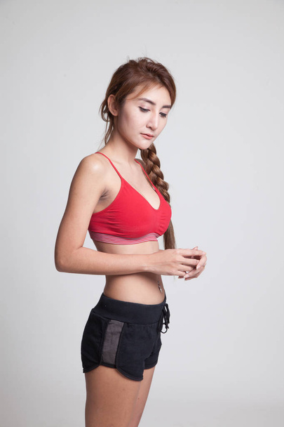 Asian strong healthy  girl  in sport dresses. - Foto, Imagen