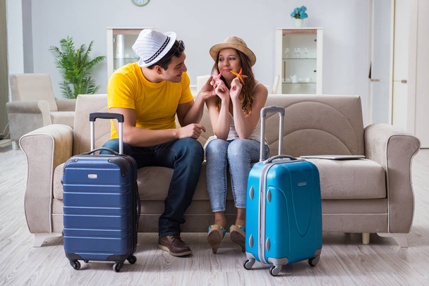 Young family preparing for travel vacation - Photo, Image