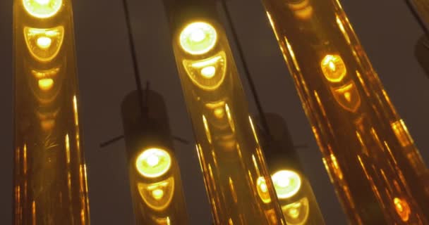 Illumination of brown glass tube lamps - Footage, Video
