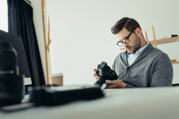 photographer working in modern office - Photo, Image