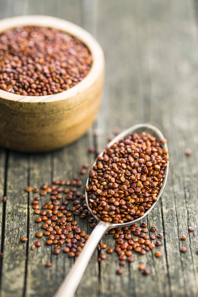 Red quinoa seeds. - Фото, изображение