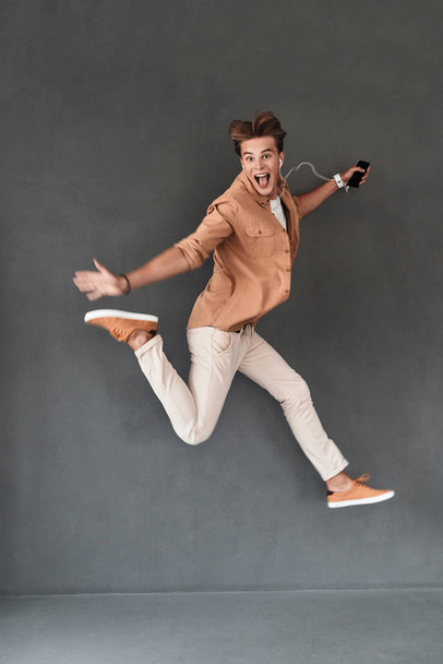 young man jumping - Фото, изображение
