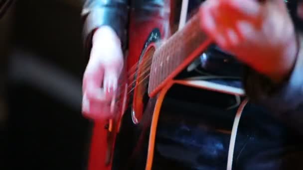 Womans hands playing acoustic guitar on concert - Felvétel, videó