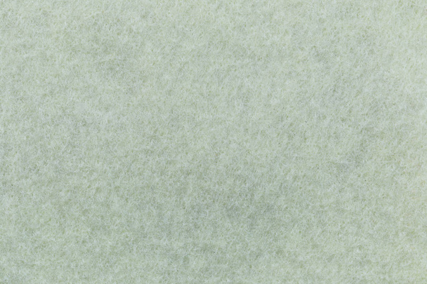 Светло-зеленая поверхность ткани из микроволокна
. - Фото, изображение