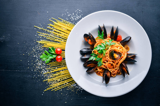 Pasta with mussels and seafood.  - Photo, Image
