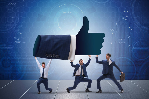 Businessmen supporting thumbs up gesture - Photo, Image