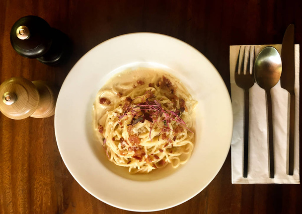Carbonara with ham and cheese  - 写真・画像