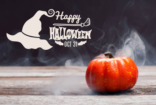 Halloween,  spooky pumpkin with smoke in the dark night - Zdjęcie, obraz