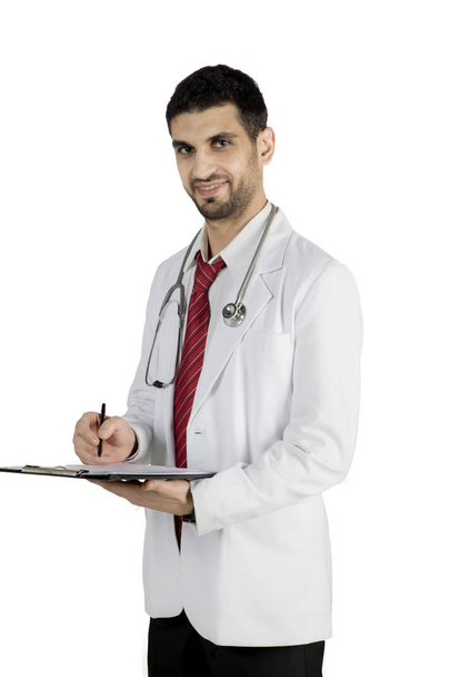 Italian doctor with clipboard on studio - 写真・画像