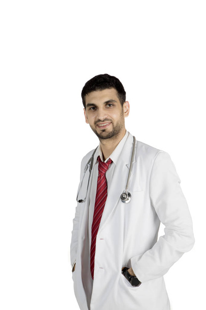 Confident Italian doctor standing on studio - Фото, изображение