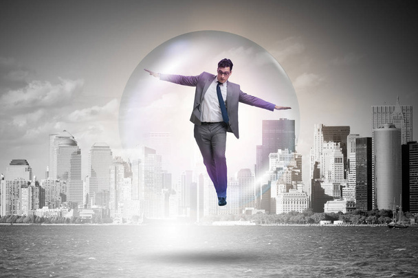 Businessman flying inside the bubble - Photo, Image