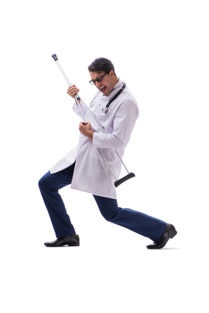 Fiatal orvos orvos áll séta elszigetelt fehér backgr - Fotó, kép