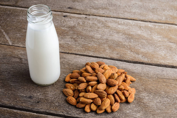 almond milk in bottle with Almonds - Photo, Image