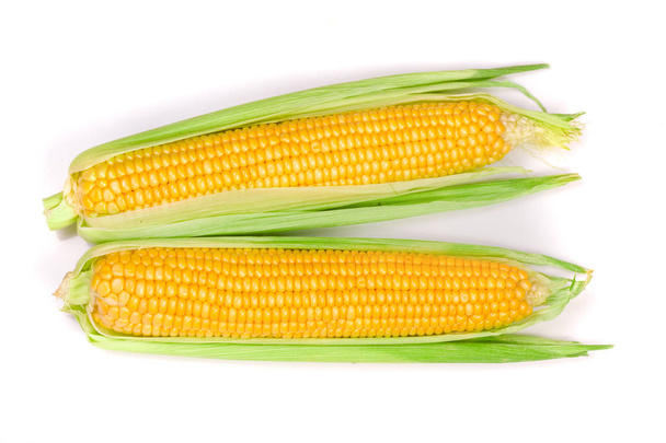 mazorca de maíz aislada sobre fondo blanco. Vista superior
 - Foto, imagen