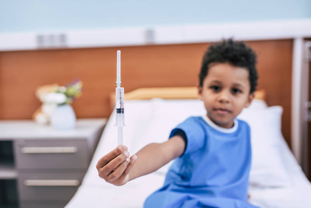 african american boy with syringe - Photo, Image