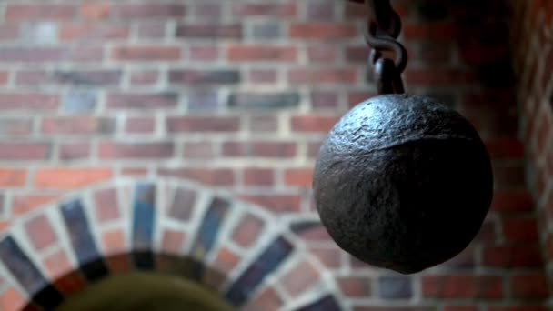 Swinging pendulum - metal ball in Castle of Teutonic Order in Malbork is largest castle in world by surface area. It was built in Marienburg, Prussia by Teutonic Knights, Ordensburg fortress. - Footage, Video