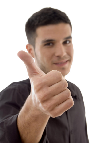 Handsome businessman showing thumbs up - Photo, image