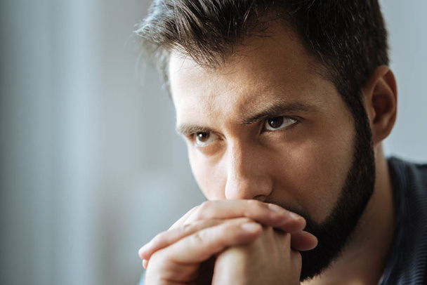 Portrait of an unhappy thoughtful man - Foto, imagen