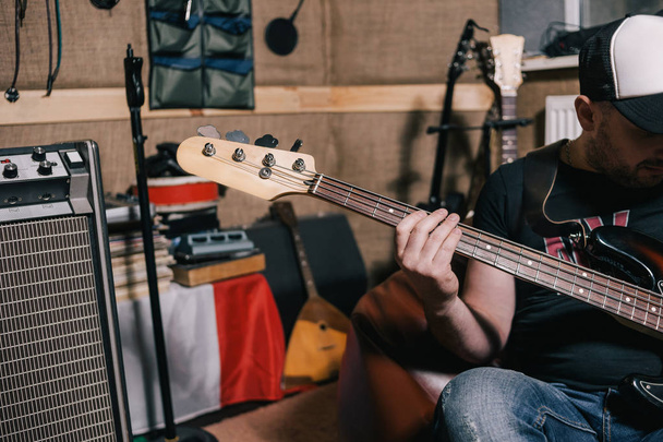 Bass guitar riff in music studio closeup - Фото, зображення