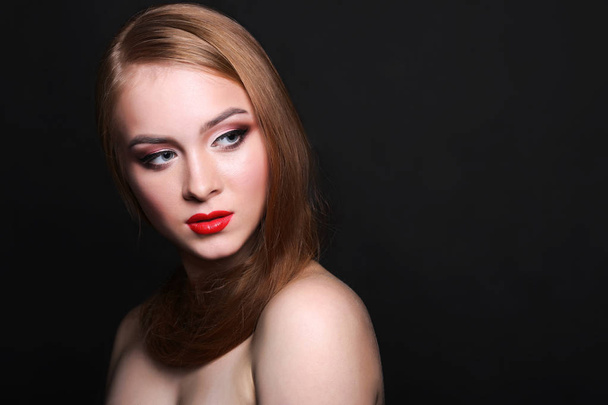 Beauty model on black background, fashion shooting - Photo, Image
