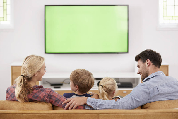 Family Watching Television - Fotó, kép