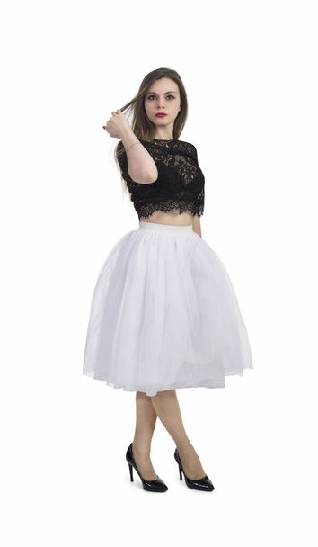 Girl in white skirt posing. - Foto, Bild