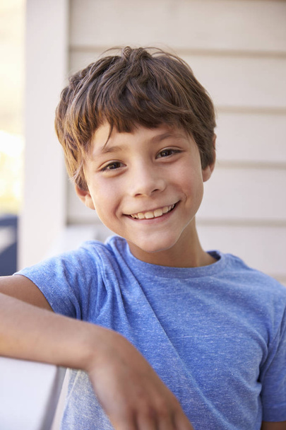 Portrait Of Boy Outside House - Foto, Bild