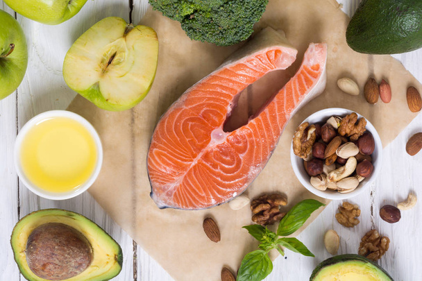 Healthy food vegetables , nuts and salmon  - Zdjęcie, obraz