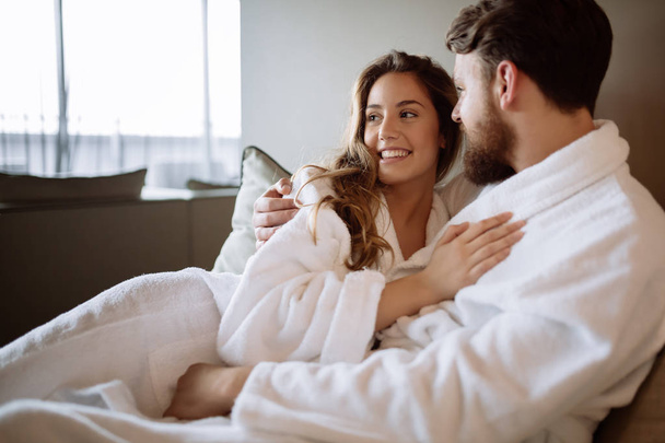 Couple wearing bathrobes in hotel - Foto, immagini