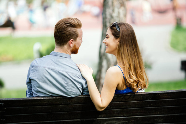 Couple in love on park bench - Fotó, kép